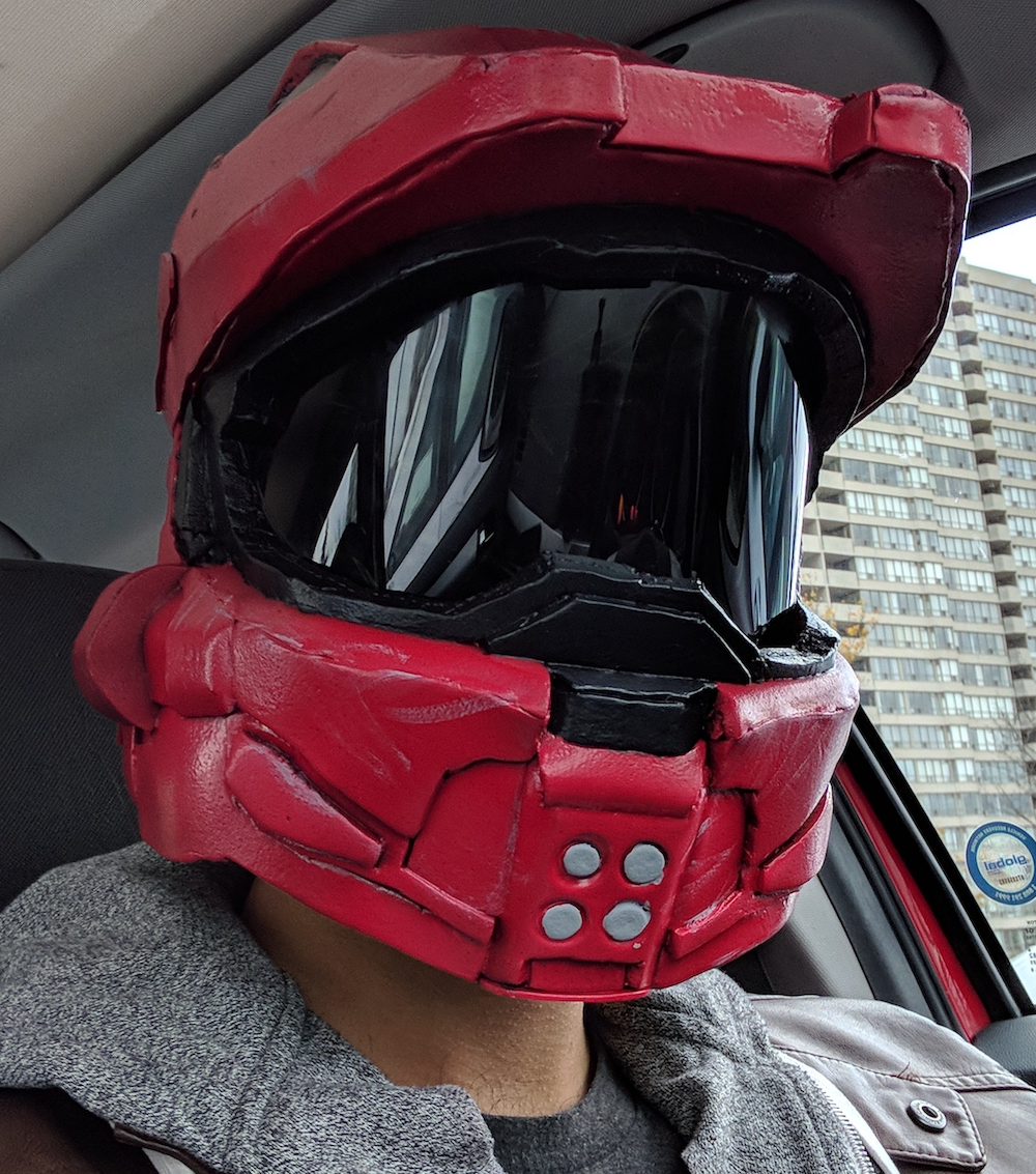 Image of Taylor wearing a red halo helmet made from EVA foam